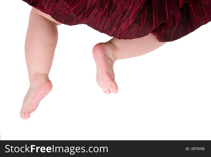 Little feet of newborn baby isolated on white background