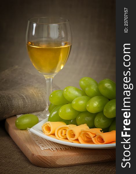 Wine, grape and cheese