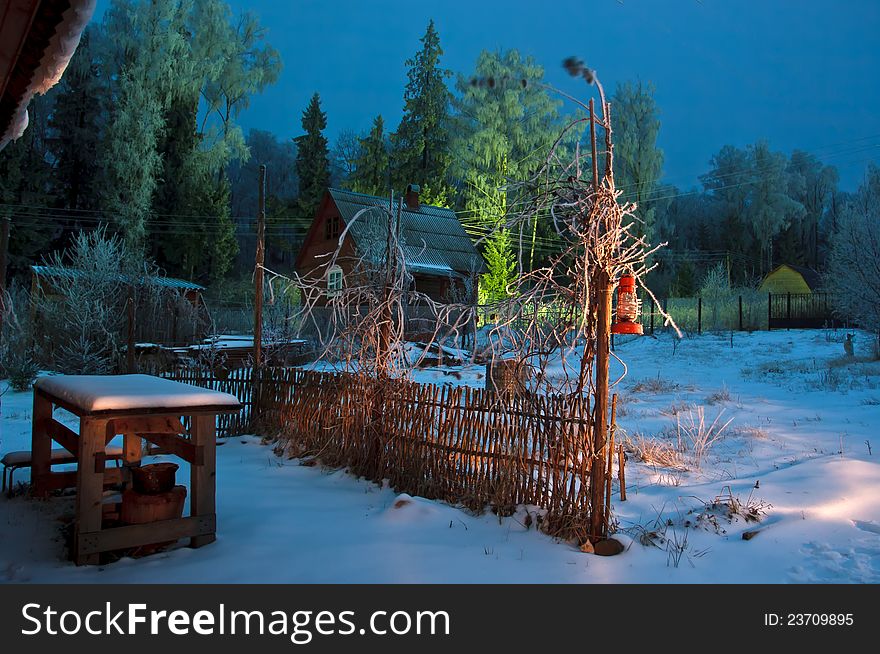 House in forest winter lantern