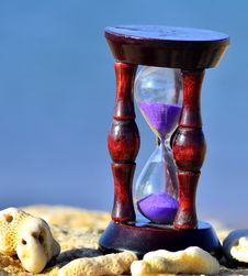 Wood Hourglass  On Blue Background Royalty Free Stock Photos