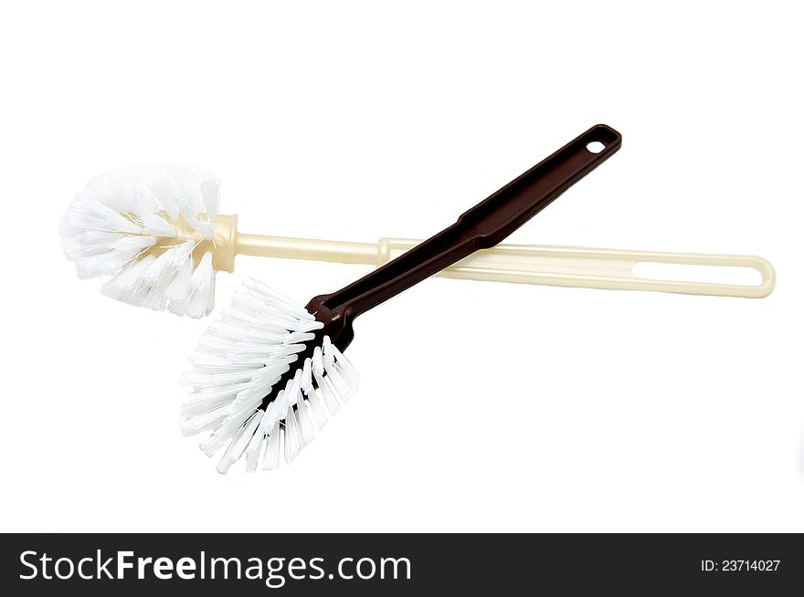 Two toilet brushes on a white background. Two toilet brushes on a white background