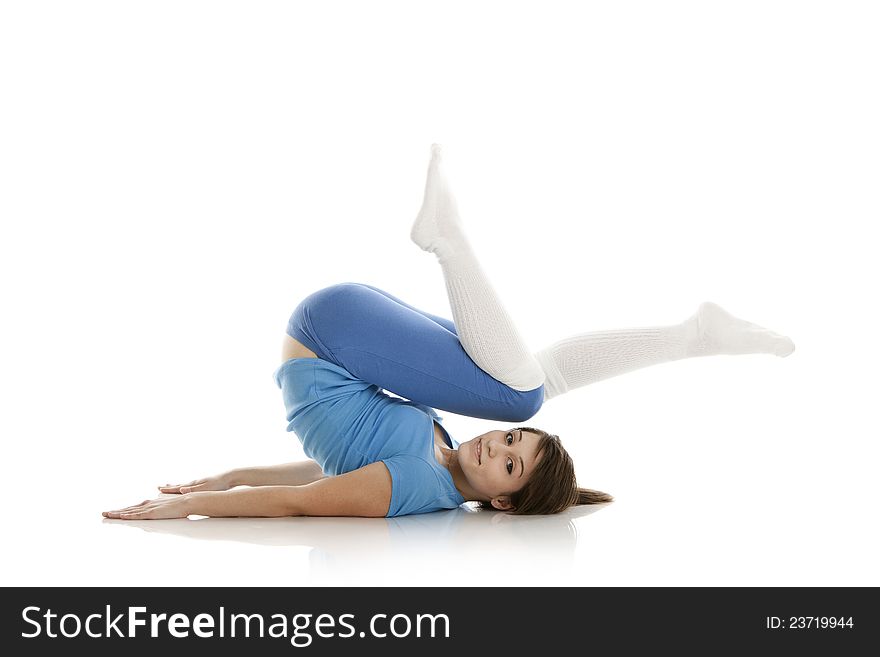 Image of a girl practicing yoga on white