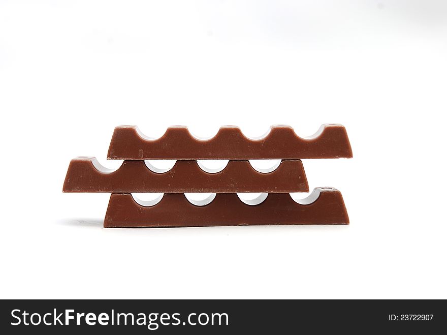 Pic of Chocolate pieces on a white back
