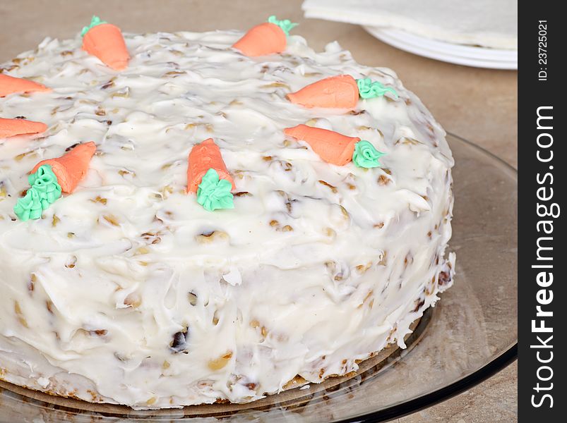 Carrot nut layer cake on a plate. Carrot nut layer cake on a plate