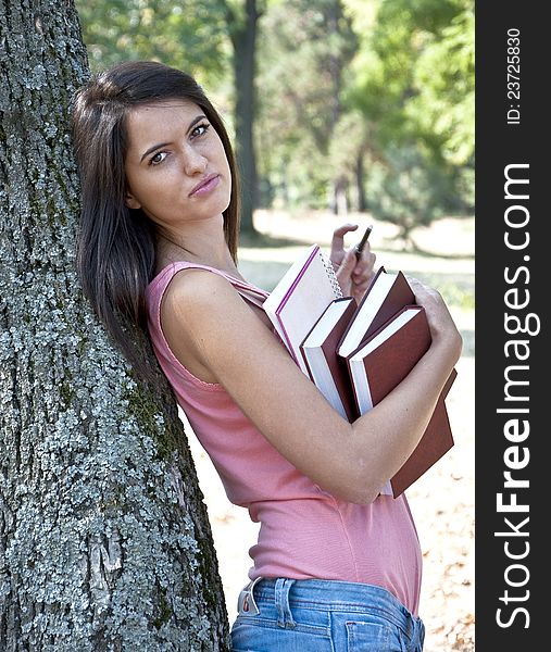 Young woman photographed in park. Young woman photographed in park