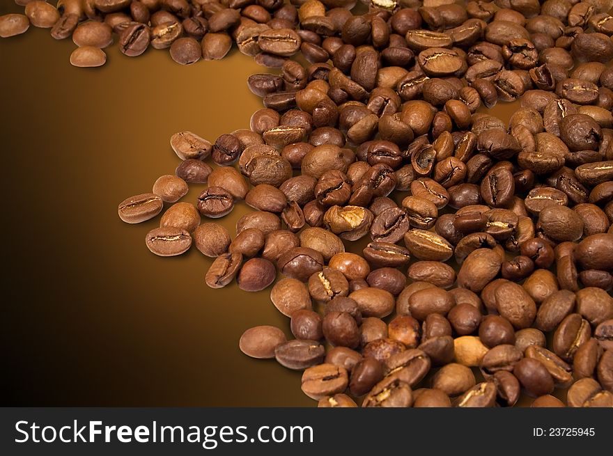 Coffee beans on a brown background