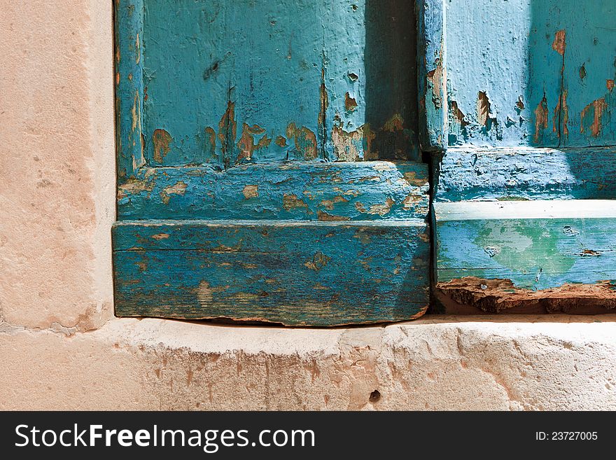 Old blue wooden door with peeling paint. Old blue wooden door with peeling paint