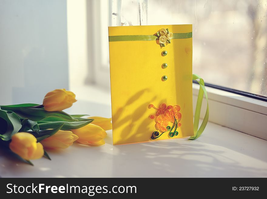 Gentle spring bouquet in a vase on a color cloth. Gentle spring bouquet in a vase on a color cloth