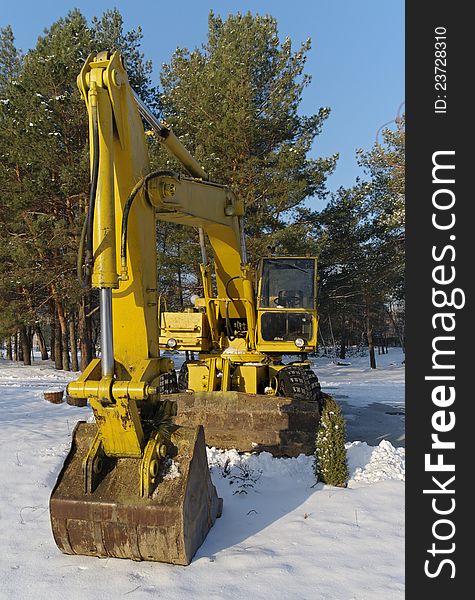 Excavator pictures winter sunny day