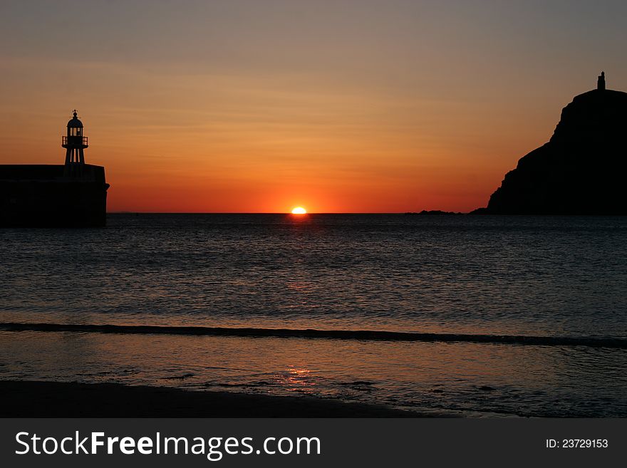 Sunset over the ocean at Port Enin on the Isle of Man