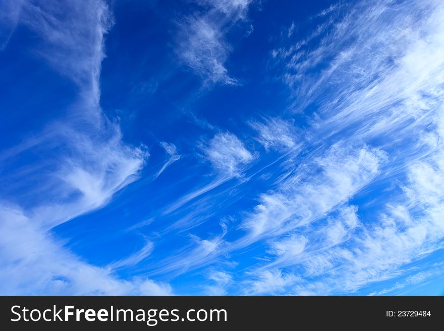 Deep blue sky with whispy white clouds. Deep blue sky with whispy white clouds