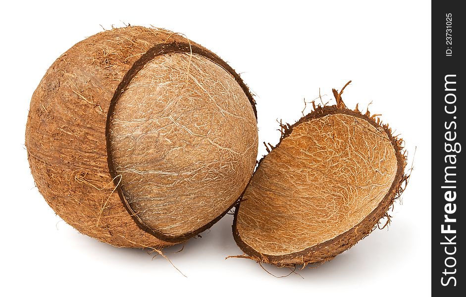 Cracked coconut against white background