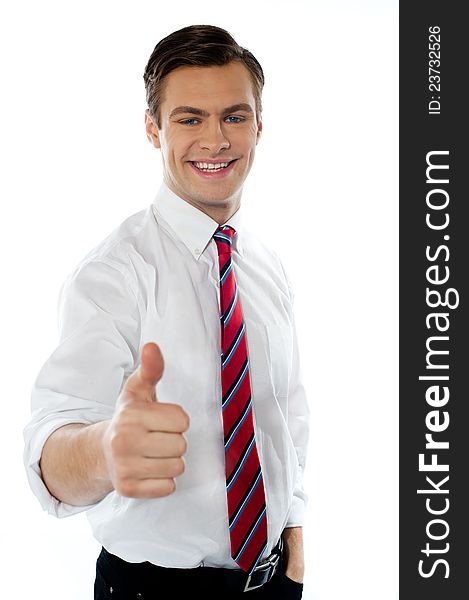 Business executive with thumbs up gesture