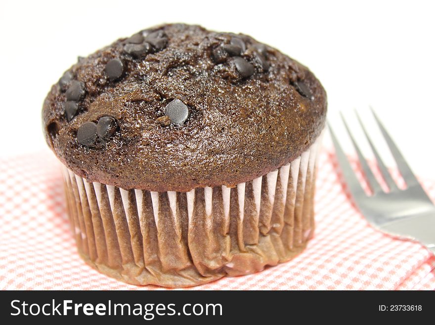 Chocolate Chip Muffin and fork. Chocolate Chip Muffin and fork