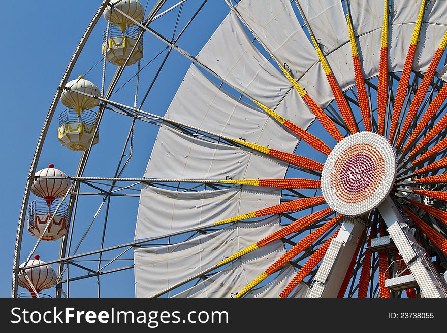 Ferris wheel and blue sky.