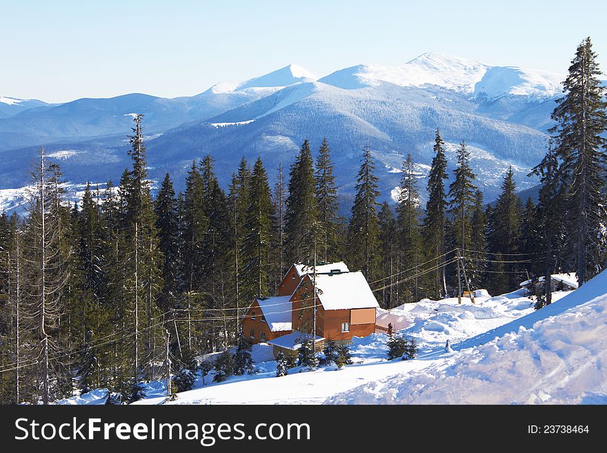 Winter small house Carpathians mountains