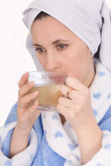 Woman In Bathrobe Drinking Tea Stock Images Woman In Bathrobe Drinking Tea Stock Images