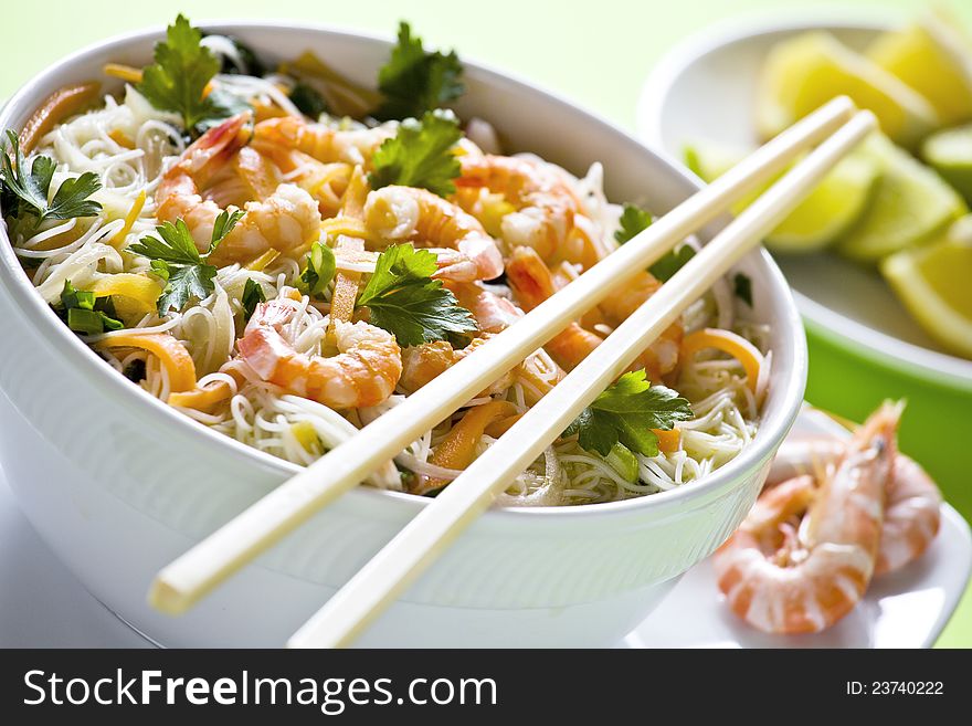 Photograph of a chinese bowl of noodles with shrimps. Photograph of a chinese bowl of noodles with shrimps