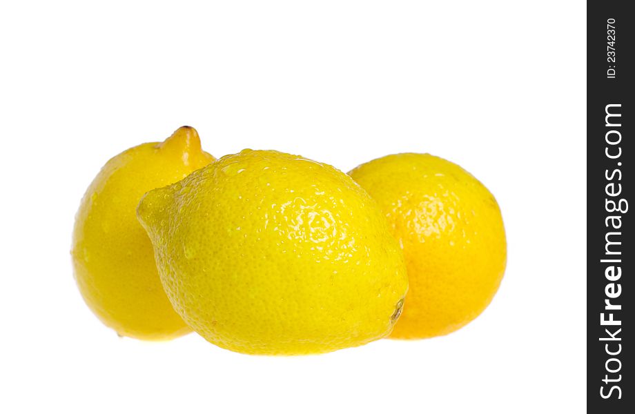 Fresh ripe lemons. Isolated on white background. Fresh ripe lemons. Isolated on white background