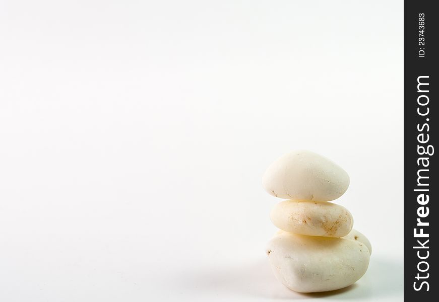 3 stones stacked together on a white background. 3 stones stacked together on a white background
