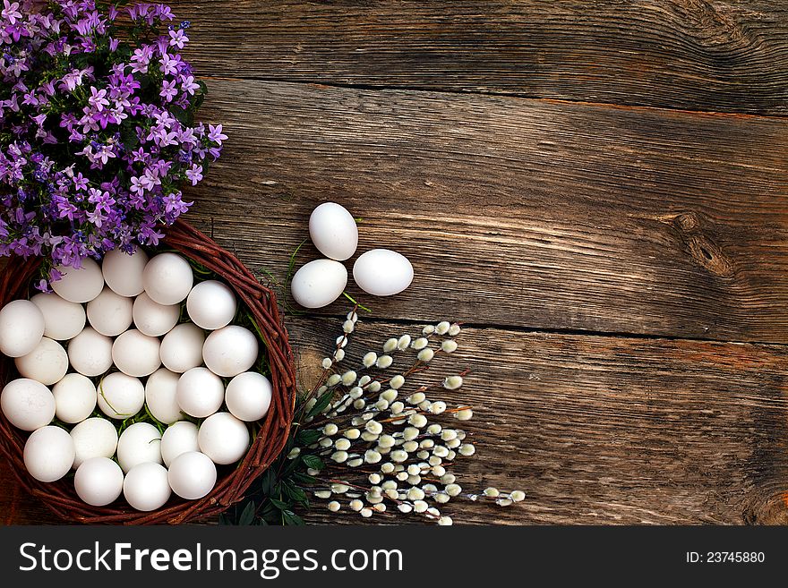 Easter eggs and  natural wooden country table, background and texture