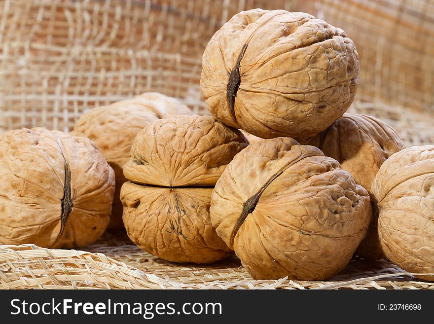 Group of walnuts on sack cloth