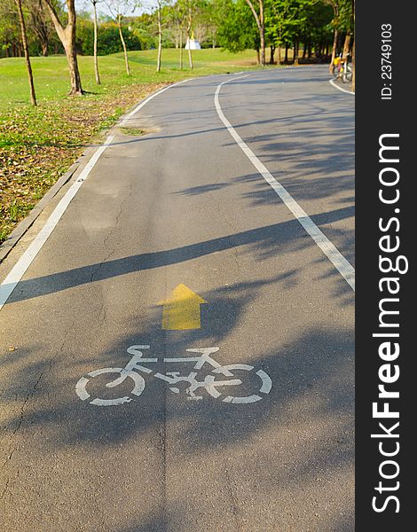 Bicycle sign with bicycle path in park