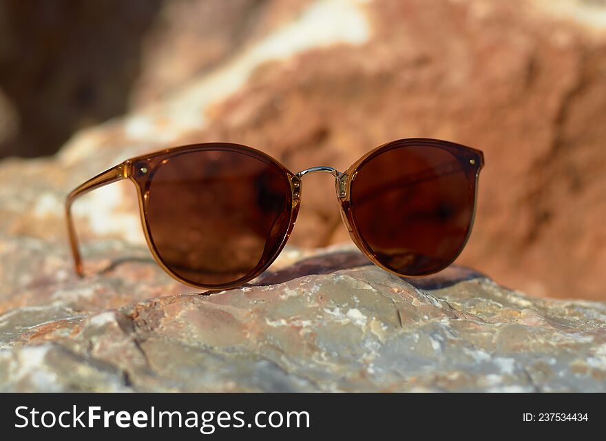 Sunglasses On The Beach Summer Sun Stone Close-up