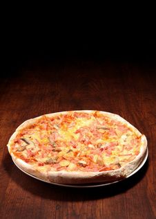 Pizza On A Wooden Table Stock Photo Pizza On A Wooden Table Stock Photo