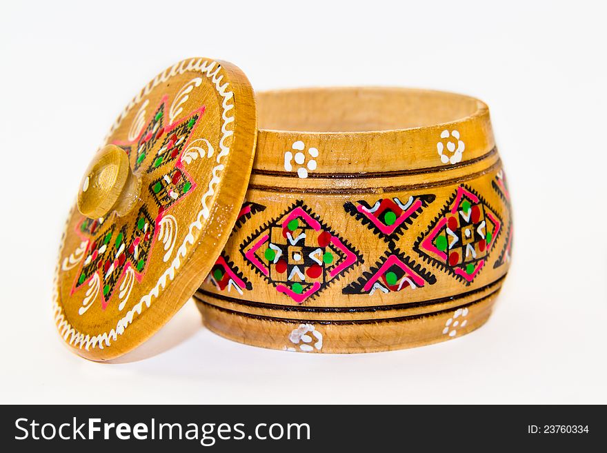 Wooden box painted with traditional ornaments on white background. Wooden box painted with traditional ornaments on white background