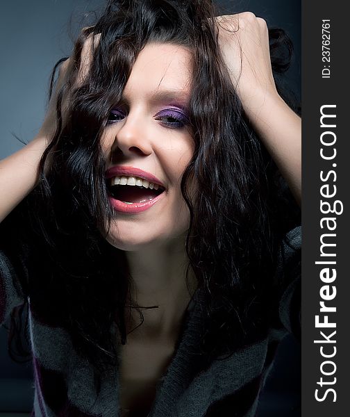 Portrait of a beautiful laughing brunette hair model. Hairstyle. Beauty. Lifestyle. Portrait of a beautiful laughing brunette hair model. Hairstyle. Beauty. Lifestyle
