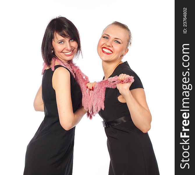 Two pretty women smiling standing scarf black dress