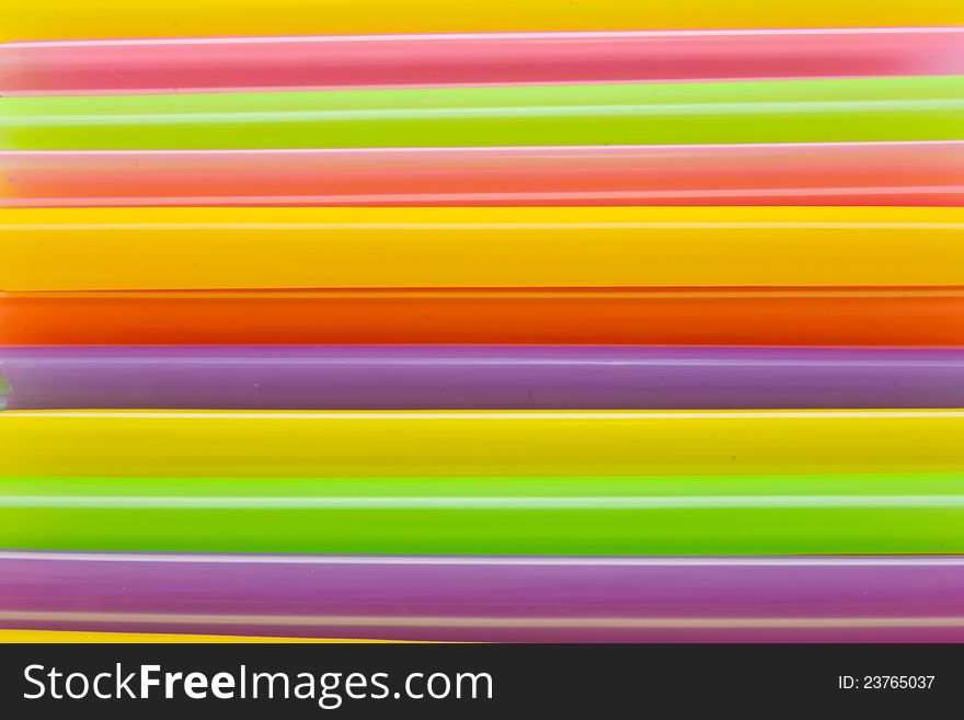 Abstract background from many multi-color of straw