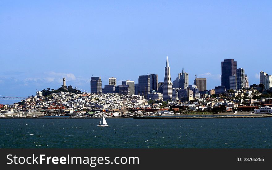 The San Francisco skyline set against a blue sky