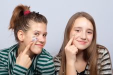 Teenage Girls Showing Hearts On Their Faces Stock Images Teenage Girls Showing Hearts On Their Faces Stock Images