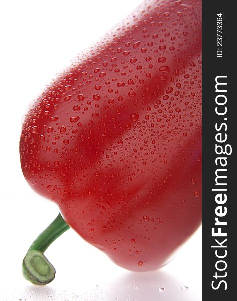 Close up of fresh red pepper isolated on white