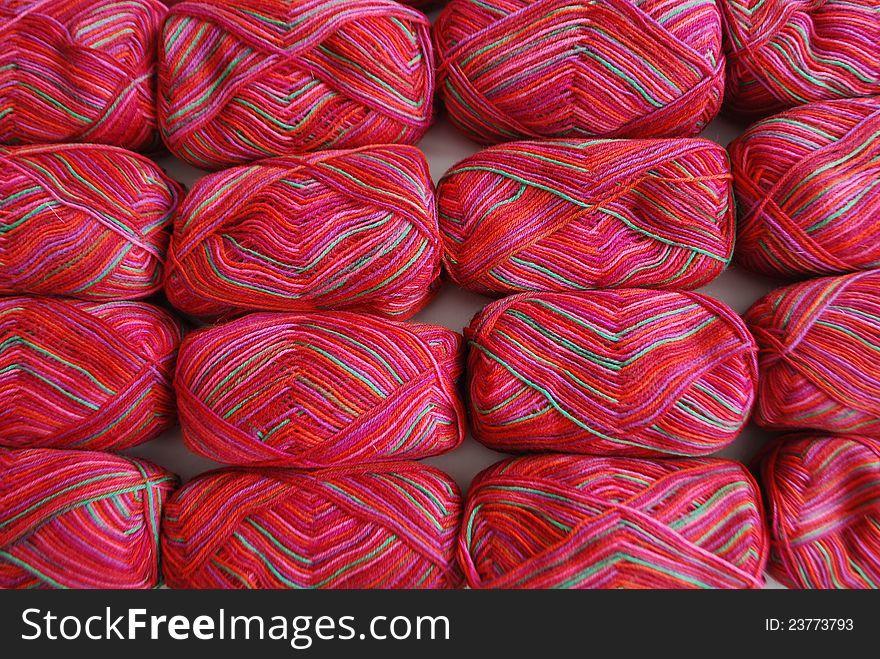 Red Yarn Wool Background Of Vivid Vibrant Colors. Red Yarn Wool Background Of Vivid Vibrant Colors