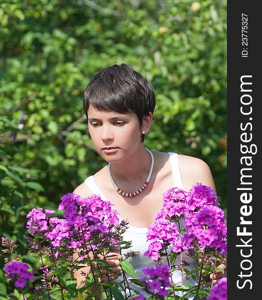 Portrait of a beautiful girl  with flowers. Portrait of a beautiful girl  with flowers