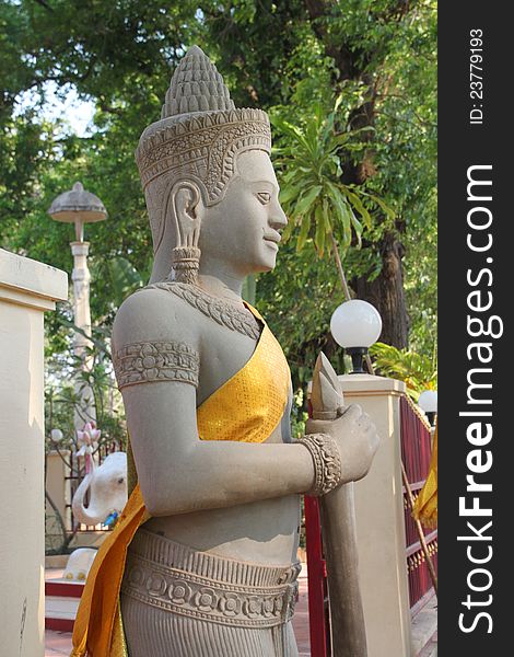 Religious statue in buddhist city pillar, Siemreap, Khmer Republic