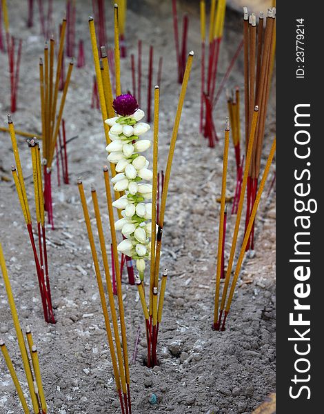 Joss sticks in pot and jasmine flower for Buddha and religious offering. Joss sticks in pot and jasmine flower for Buddha and religious offering