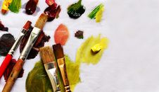 Paint Brushes And Different Paint Pigments Royalty Free Stock Image