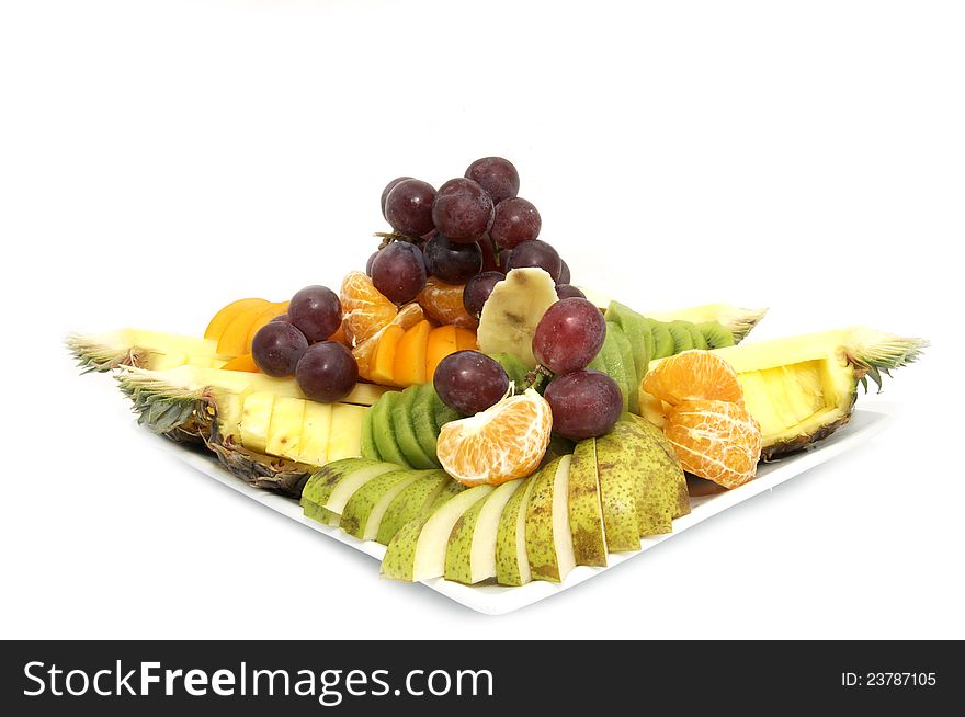 A large plate of fruit