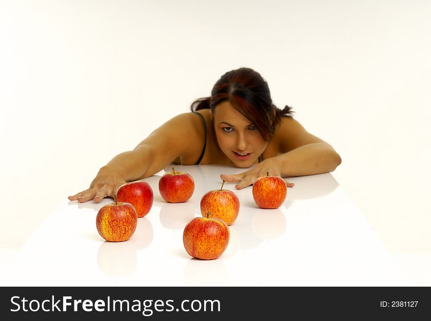 Beautiful young woman with apple