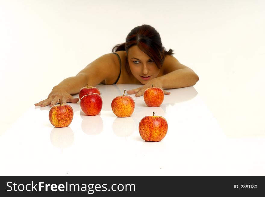 Beautiful young woman with apple