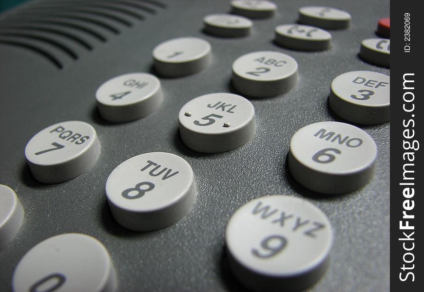 Phone keypad with circular buttons