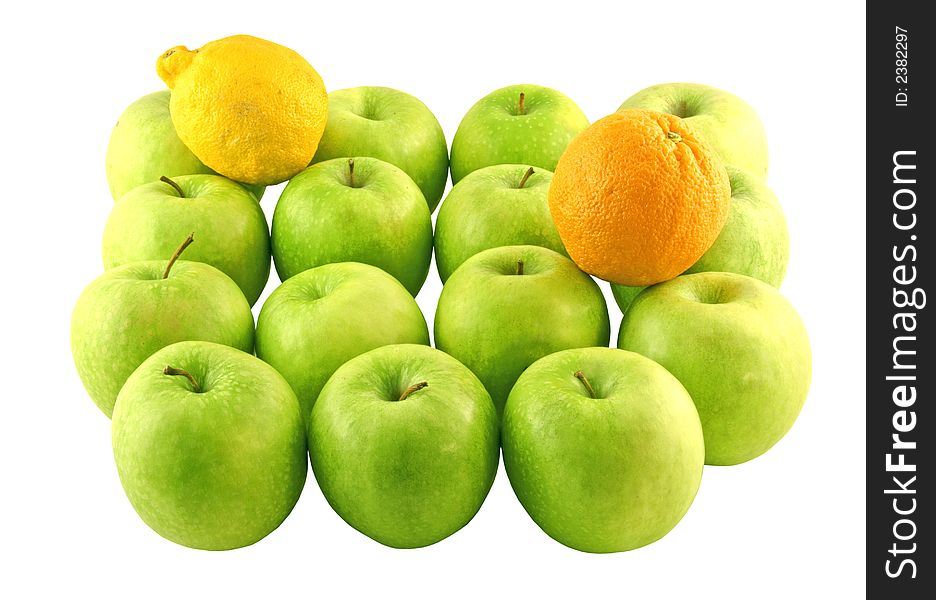Green apples, a lemon and an orange set on a white background