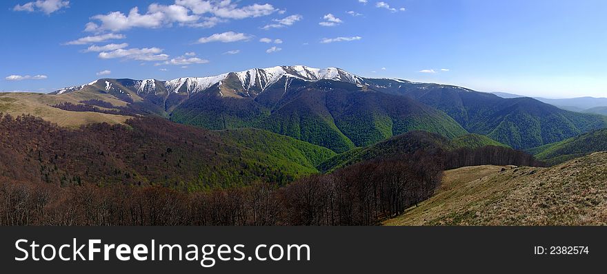 Scenic panoramic picture of carpathian mountain range in springtime. Scenic panoramic picture of carpathian mountain range in springtime