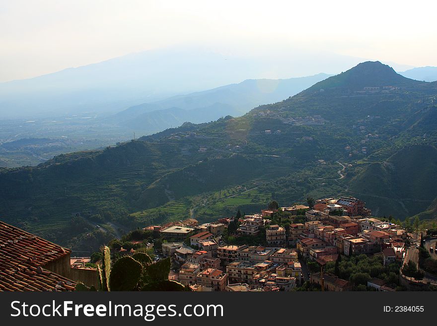 Dominant sight from the top of the taormina village, east of sicily in italy near mount Etna. Dominant sight from the top of the taormina village, east of sicily in italy near mount Etna