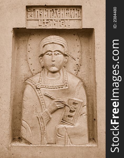 Old Russian bas-relief of saint Panthelemon. Old Russian bas-relief of saint Panthelemon