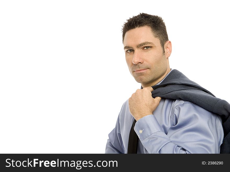 Businessman in a suit stands holding a jacket. Businessman in a suit stands holding a jacket